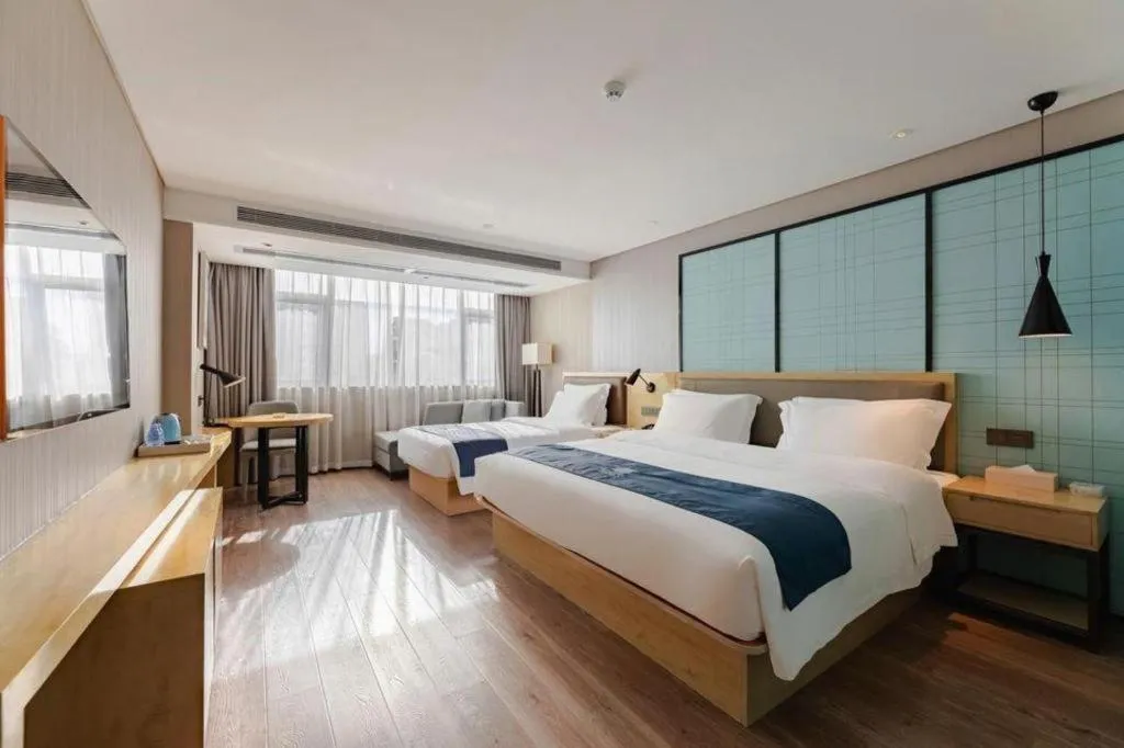 Bed in Echarm Hotel Nanning Qingxiu Mountain