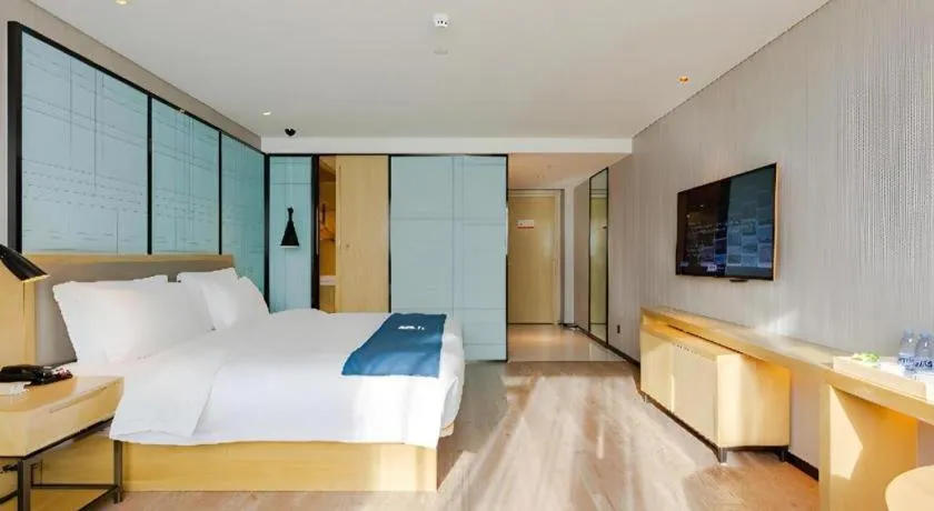 Bed in Echarm Hotel Nanning Qingxiu Mountain