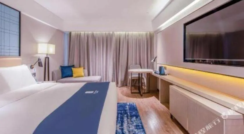 Bed in Echarm Hotel Nanning Qingxiu Mountain