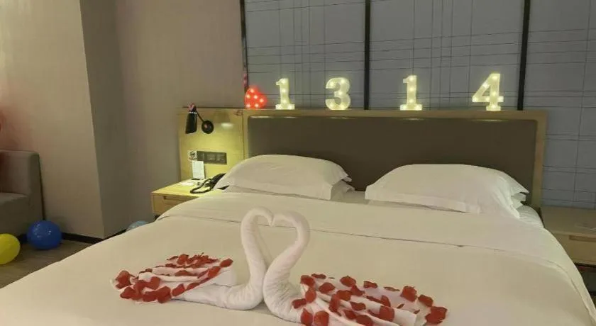 Bed in Echarm Hotel Nanning Qingxiu Mountain