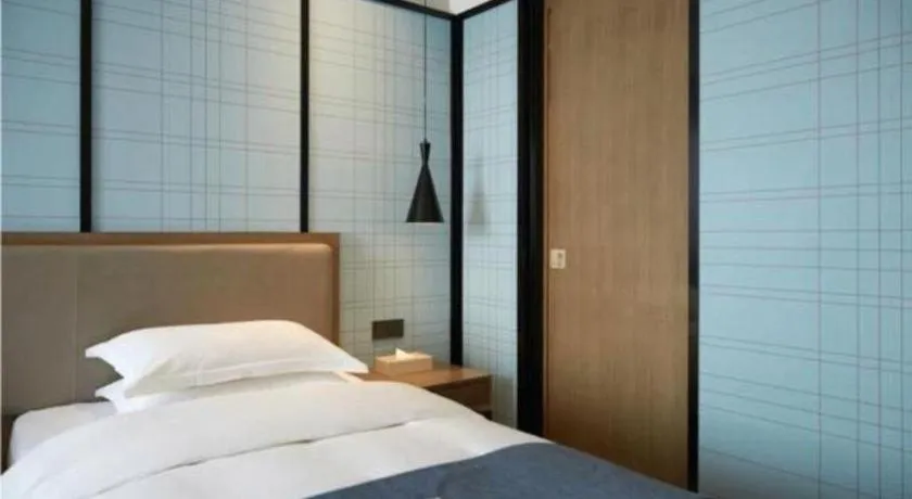 Bed in Echarm Hotel Nanning Qingxiu Mountain