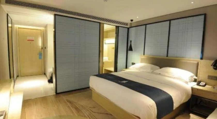 Bed in Echarm Hotel Nanning Qingxiu Mountain