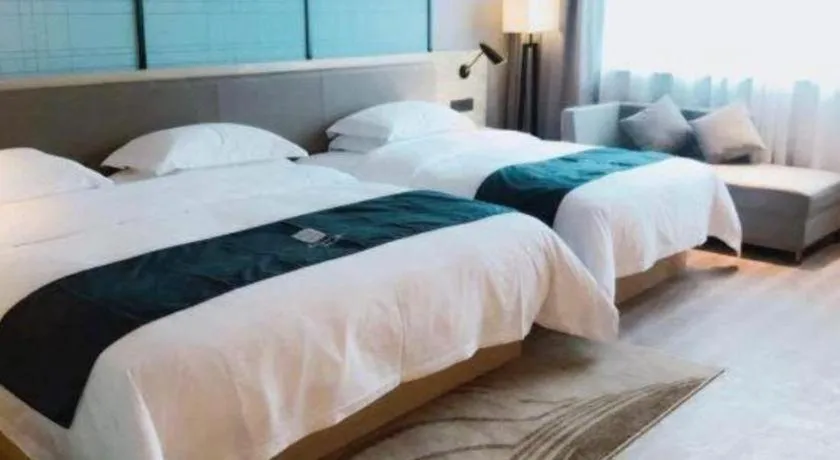Bed in Echarm Hotel Nanning Qingxiu Mountain