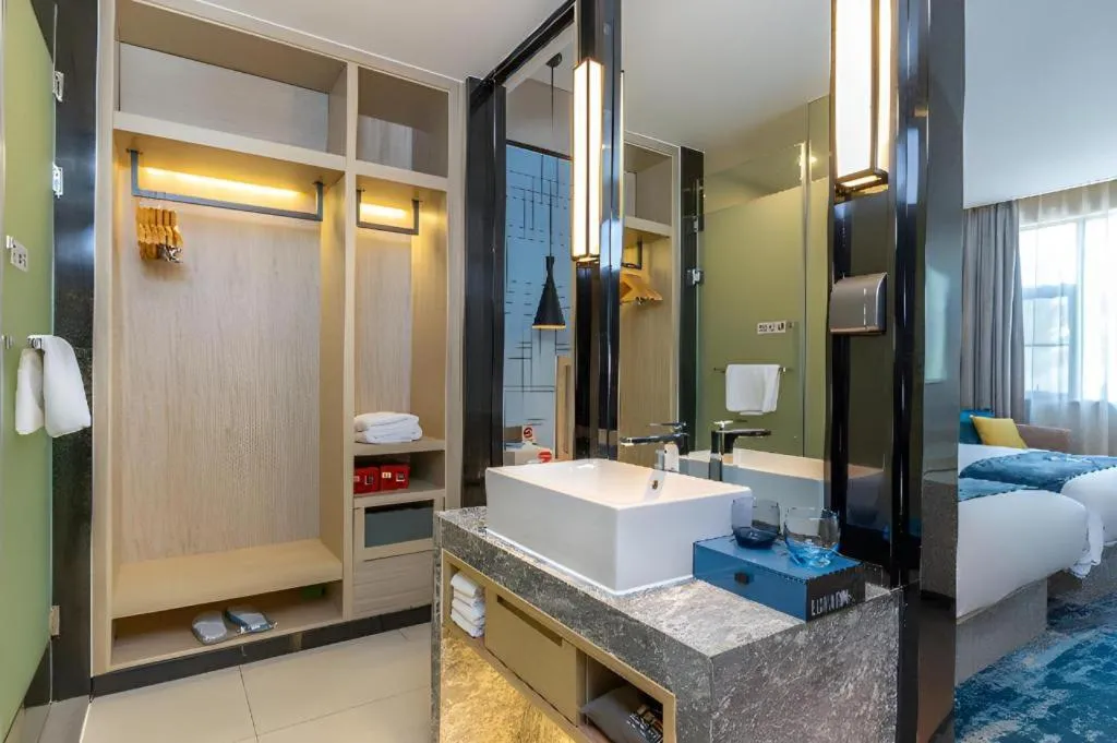 Bed in Echarm Hotel Nanning Qingxiu Mountain