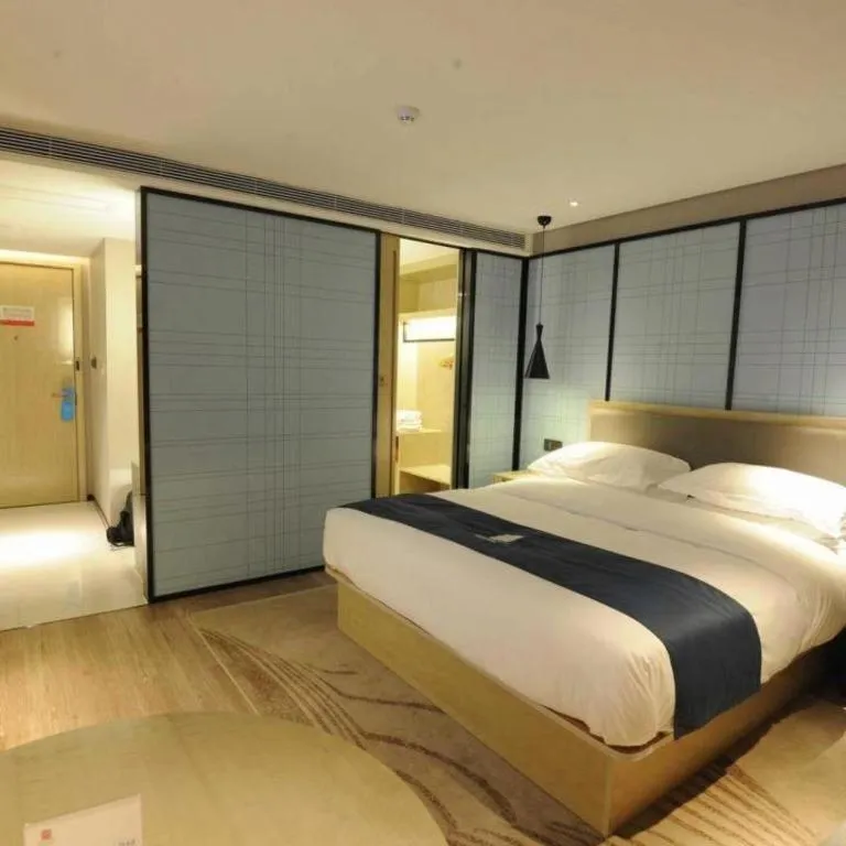 Bed in Echarm Hotel Nanning Qingxiu Mountain