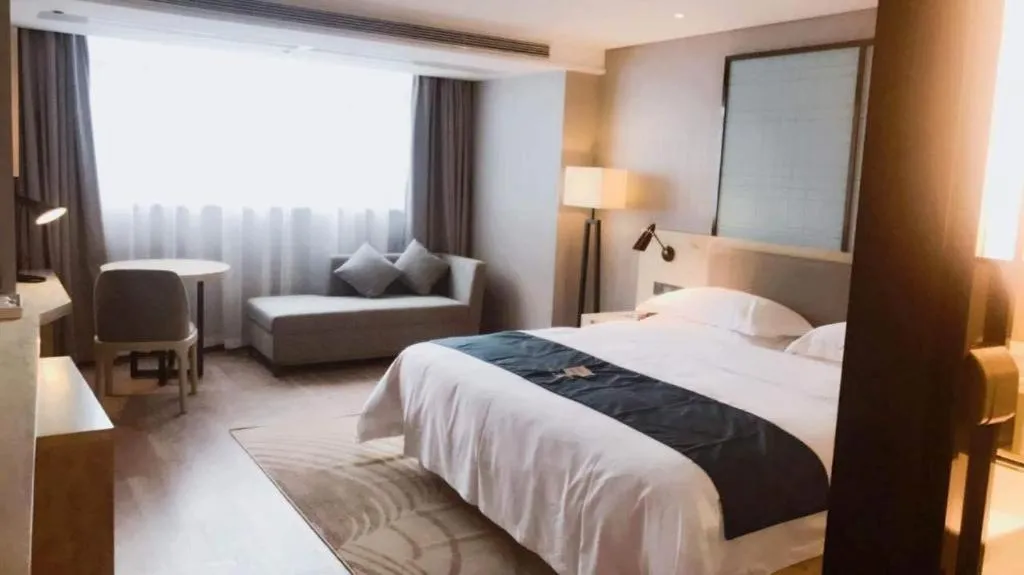 Bed in Echarm Hotel Nanning Qingxiu Mountain