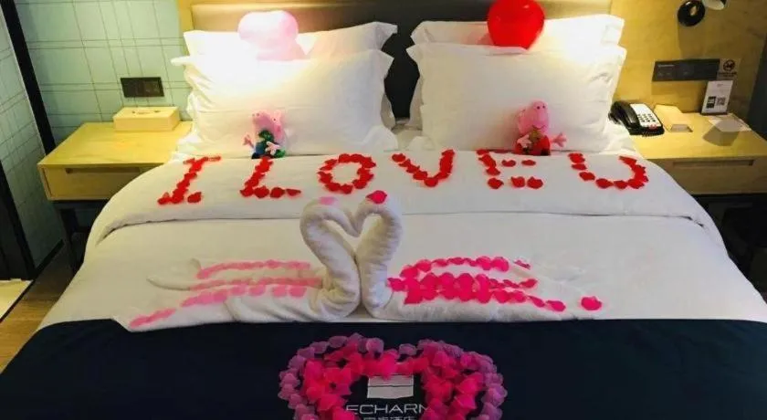 Bed in Echarm Hotel Nanning Qingxiu Mountain