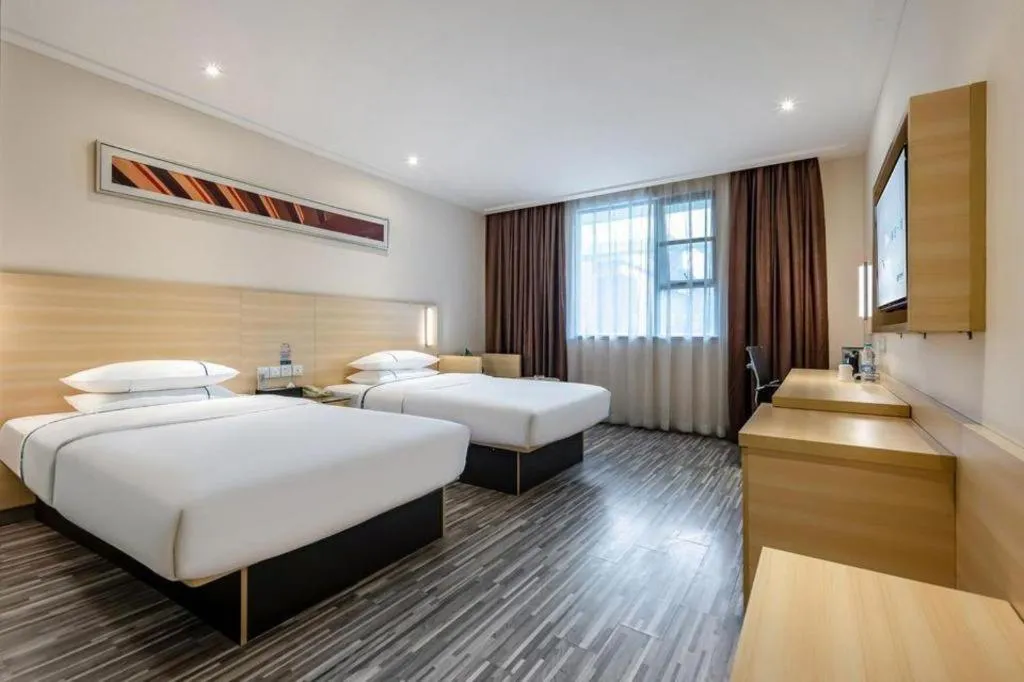 Bed in City Comfort Inn Guangzhou Renhe Metro Station Huatong Plaza