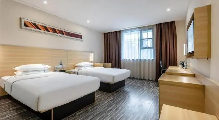 Bed in City Comfort Inn Guangzhou Renhe Metro Station Huatong Plaza Bed in City Comfort Inn Guangzhou Renhe Metro Station Huatong Plaza