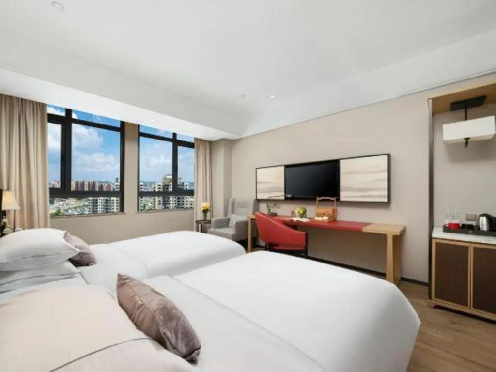 Bed in Echeng Hotel Nanning Jiangnan Wanda Baisha Avenue