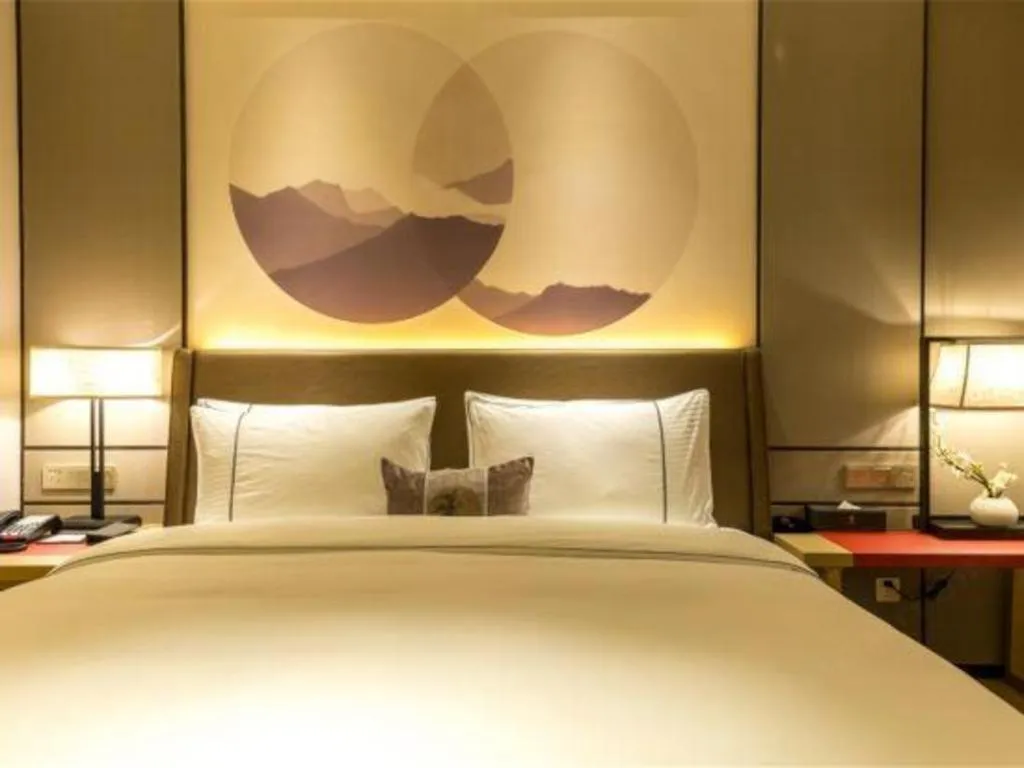 Bed in Echeng Hotel Nanning Jiangnan Wanda Baisha Avenue