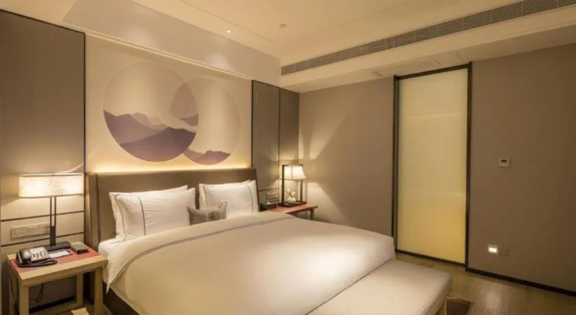 Bed in Echeng Hotel Nanning Jiangnan Wanda Baisha Avenue