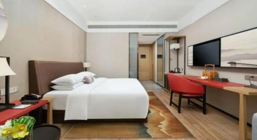 Bed in Echeng Hotel Nanning Jiangnan Wanda Baisha Avenue