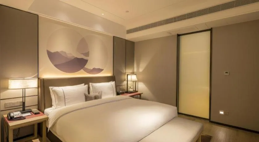 Bed in Echeng Hotel Nanning Jiangnan Wanda Baisha Avenue