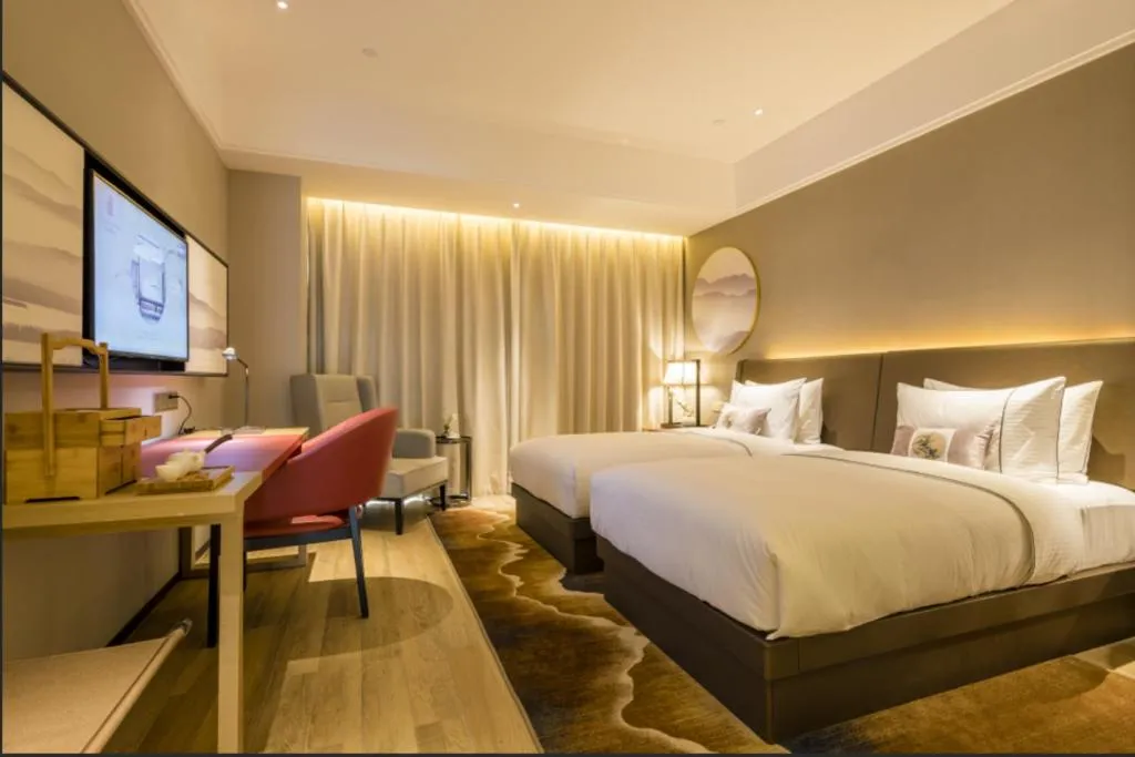 Bed in Echeng Hotel Nanning Jiangnan Wanda Baisha Avenue