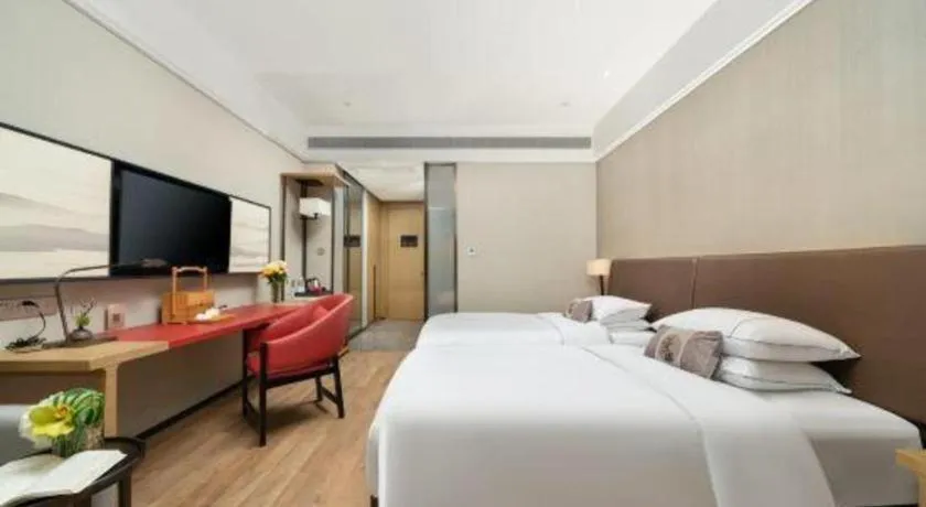 Bed in Echeng Hotel Nanning Jiangnan Wanda Baisha Avenue