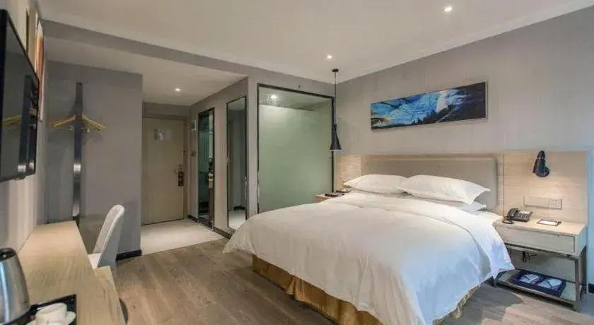 Bed in Borrman Hotel Wuhan Yangluo Metro Station Shenshuigang Bed in Borrman Hotel Wuhan Yangluo Metro Station Shenshuigang