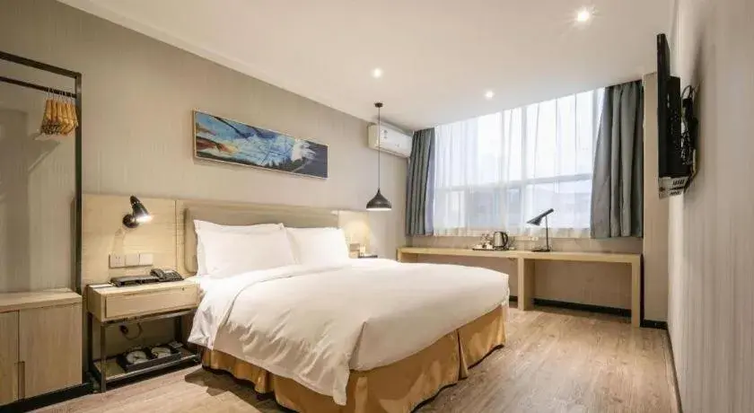Bed in Borrman Hotel Wuhan Yangluo Metro Station Shenshuigang Bed in Borrman Hotel Wuhan Yangluo Metro Station Shenshuigang