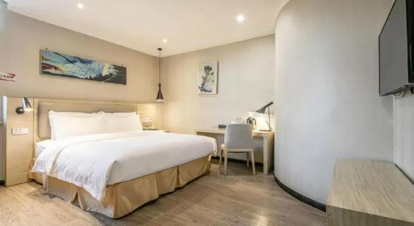 Bed in Borrman Hotel Wuhan Yangluo Metro Station Shenshuigang Bed in Borrman Hotel Wuhan Yangluo Metro Station Shenshuigang