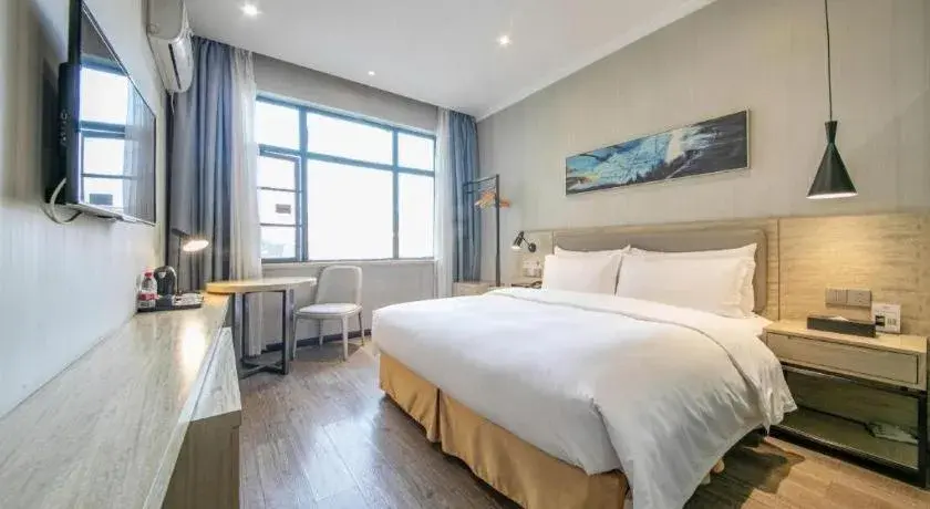 Bed in Borrman Hotel Wuhan Yangluo Metro Station Shenshuigang Bed in Borrman Hotel Wuhan Yangluo Metro Station Shenshuigang