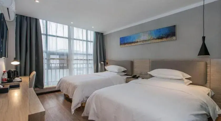 Bed in Borrman Hotel Wuhan Yangluo Metro Station Shenshuigang Bed in Borrman Hotel Wuhan Yangluo Metro Station Shenshuigang
