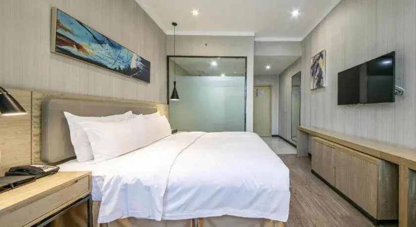 Bed in Borrman Hotel Wuhan Yangluo Metro Station Shenshuigang Bed in Borrman Hotel Wuhan Yangluo Metro Station Shenshuigang