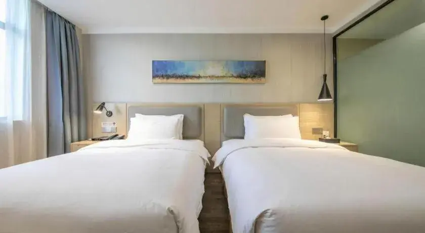 Bed in Borrman Hotel Wuhan Yangluo Metro Station Shenshuigang Bed in Borrman Hotel Wuhan Yangluo Metro Station Shenshuigang