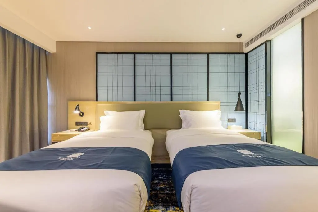 Bed in Echarm Hotel Nanning Baisha Avenue Tingjiang Interchange BBK