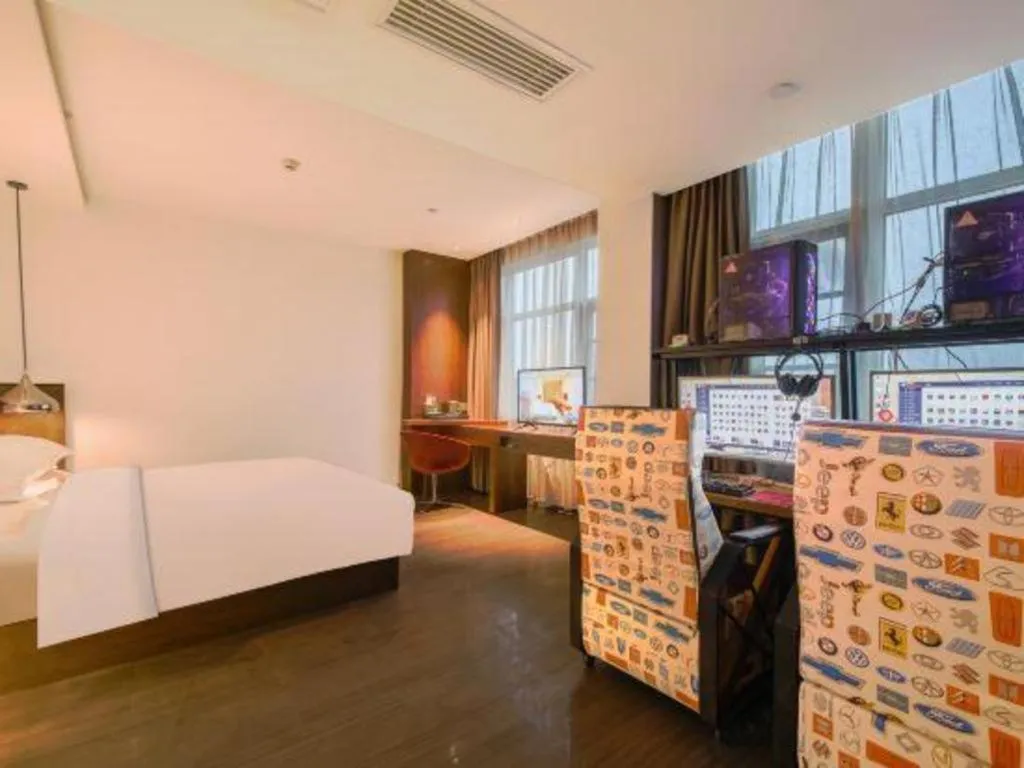 Bed in Borrman Hotel Zhongxiang Railway Station Mochou Village