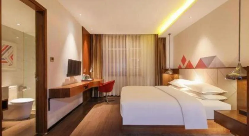 Bed in Borrman Hotel Zhongxiang Railway Station Mochou Village