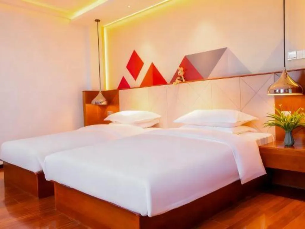 Bed in Borrman Hotel Zhongxiang Railway Station Mochou Village