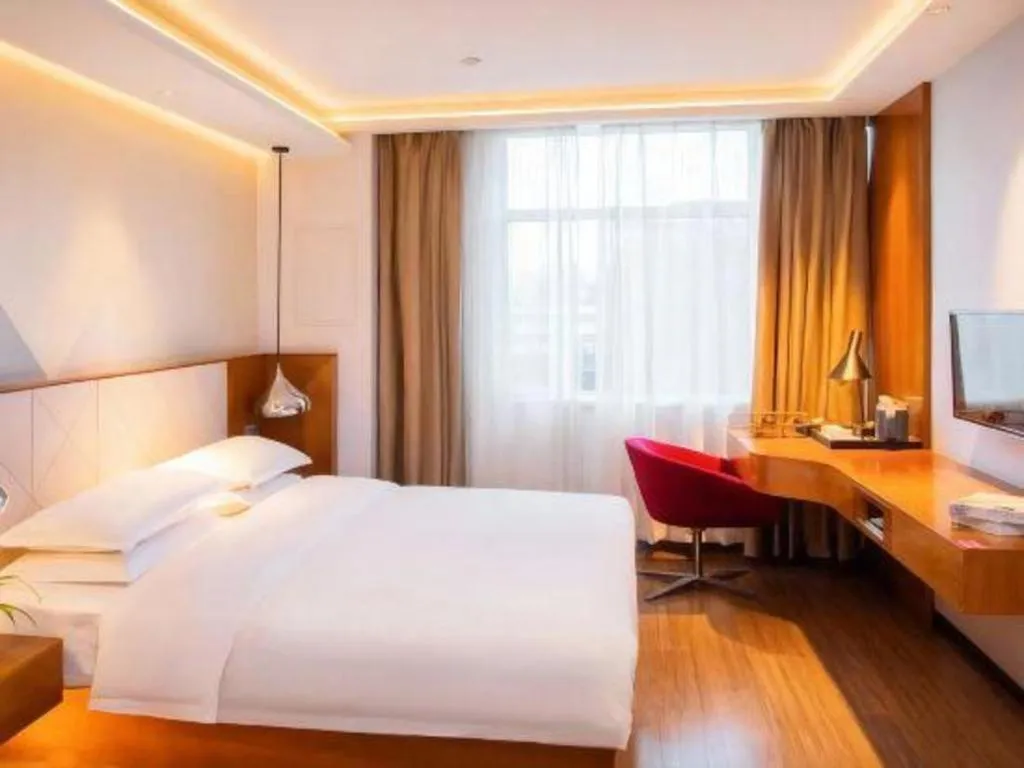 Bed in Borrman Hotel Zhongxiang Railway Station Mochou Village