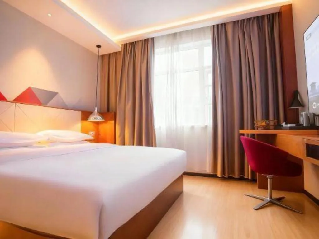 Bed in Borrman Hotel Zhongxiang Railway Station Mochou Village