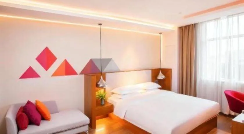 Bed in Borrman Hotel Zhongxiang Railway Station Mochou Village