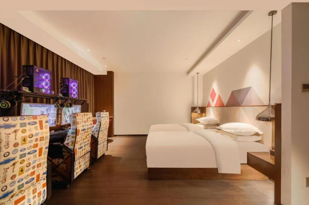 Bed in Borrman Hotel Zhongxiang Railway Station Mochou Village