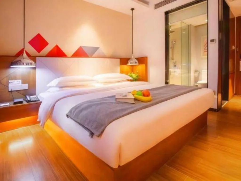 Bed in Borrman Hotel Zhongxiang Railway Station Mochou Village