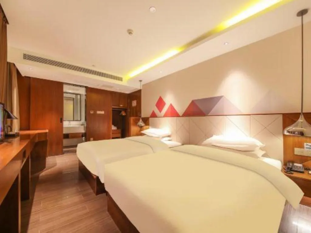 Bed in Borrman Hotel Zhongxiang Railway Station Mochou Village