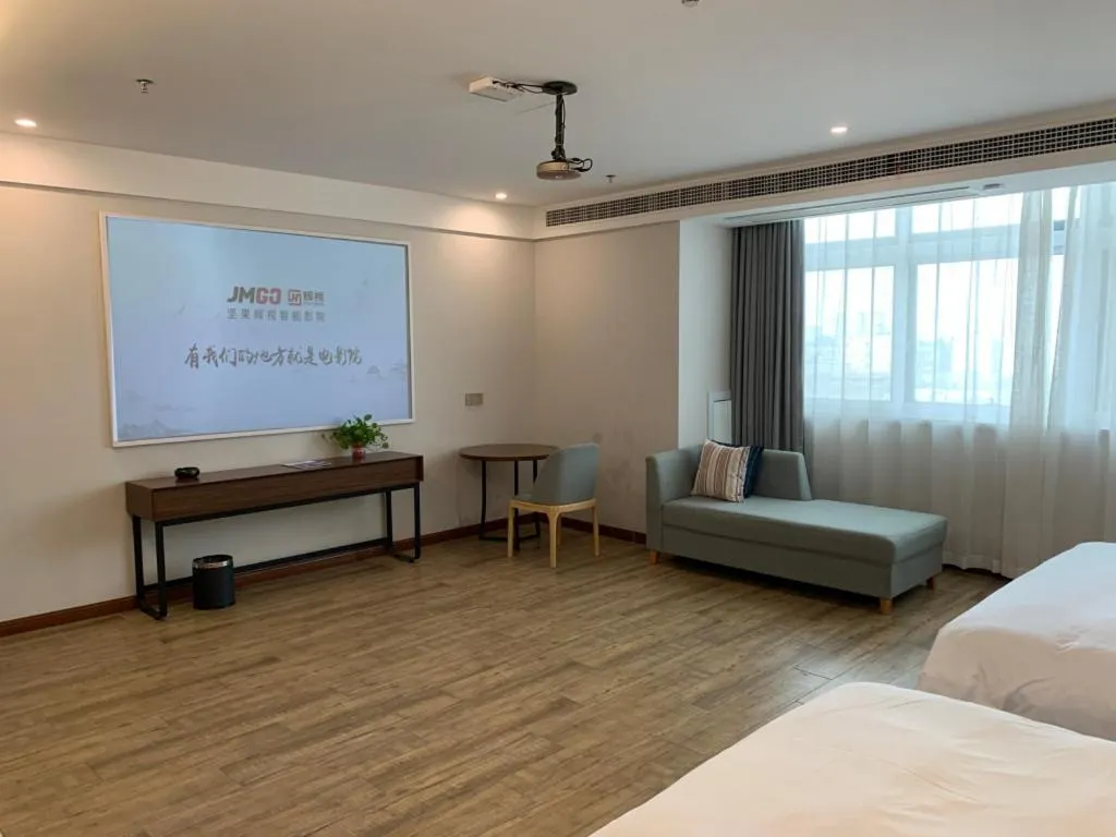 Bed in Borrman Hotel East Huai'an Railway Station Zhou 'Enlai Memorial