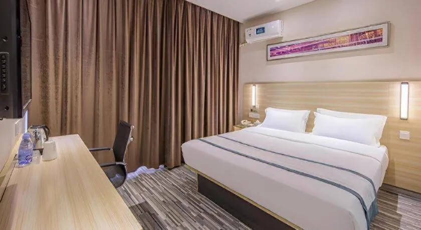 Bed in JTOUR Inn Wuzhou Arcade City Sanzongfu