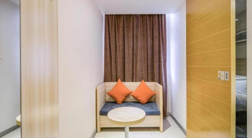 Bed in JTOUR Inn Wuzhou Arcade City Sanzongfu