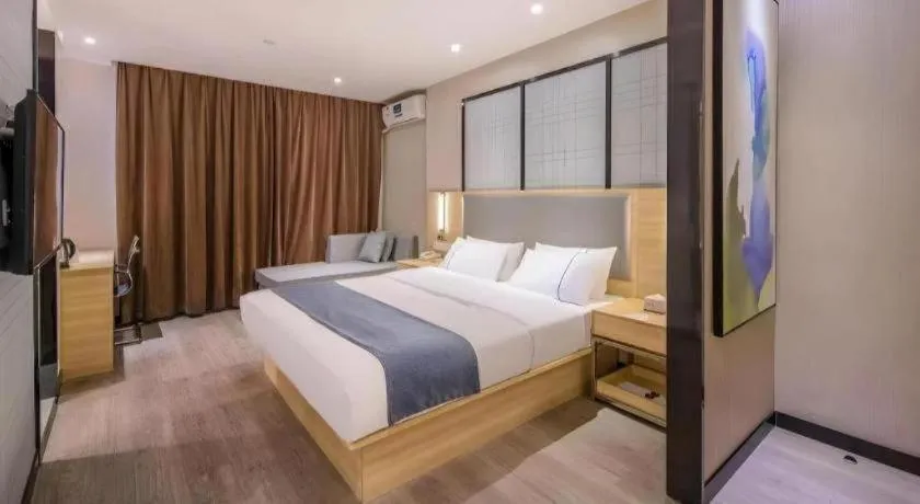 Bed in JTOUR Inn Wuzhou Arcade City Sanzongfu