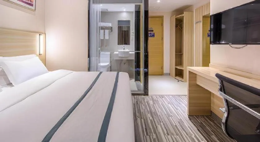 Bed in JTOUR Inn Wuzhou Arcade City Sanzongfu