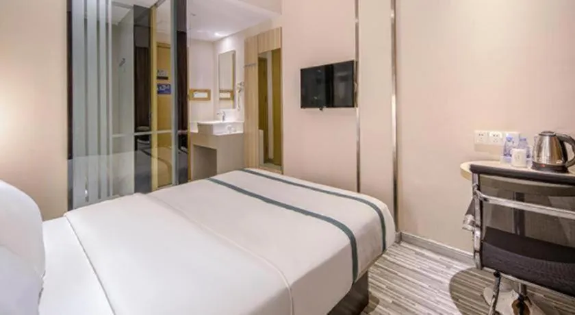 Bed in JTOUR Inn Wuzhou Arcade City Sanzongfu