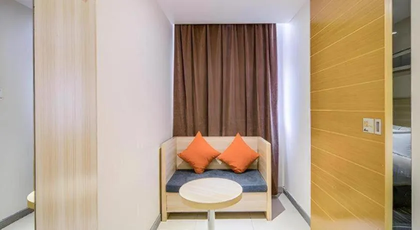 Bed in JTOUR Inn Wuzhou Arcade City Sanzongfu