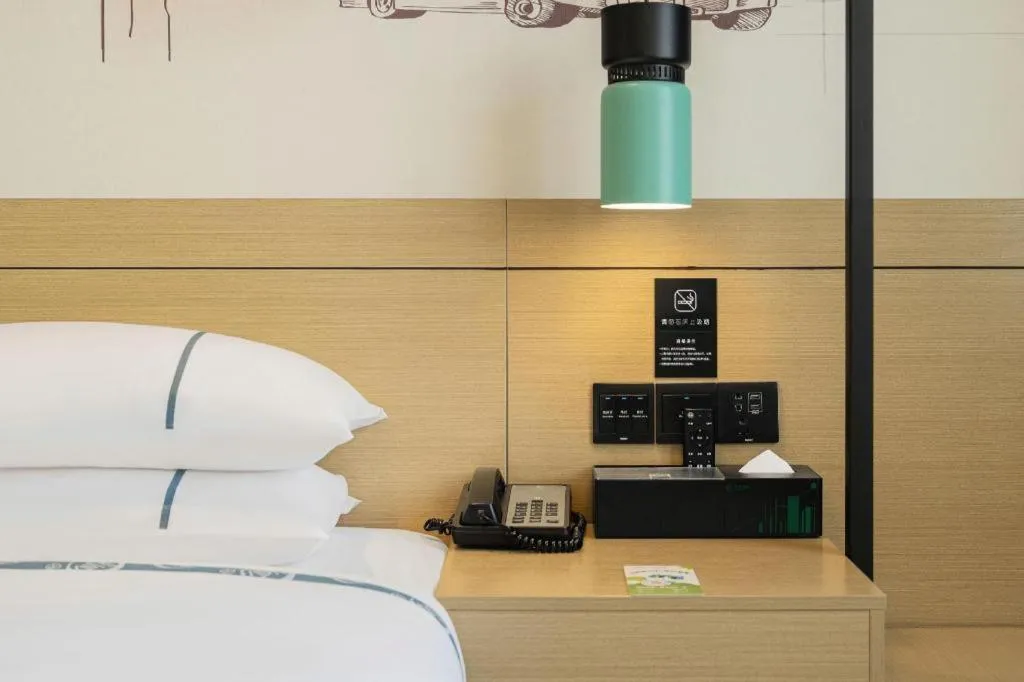 Bed in City Comfort Inn Guangzhou Liwan Zengjiao Jushu Metro Station