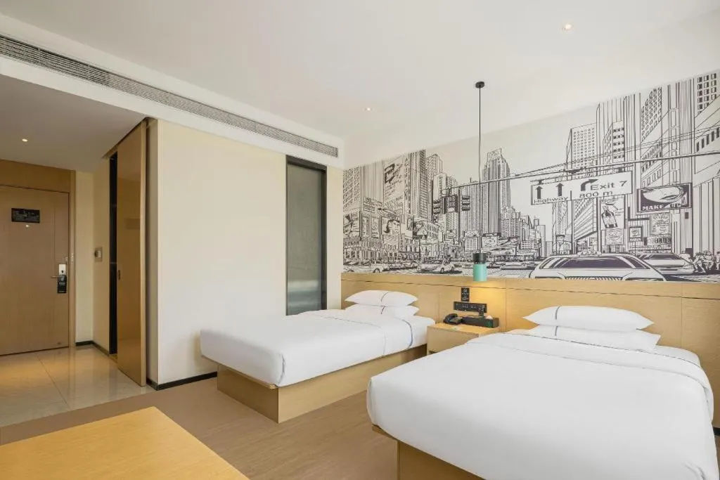 Bed in City Comfort Inn Guangzhou Liwan Zengjiao Jushu Metro Station