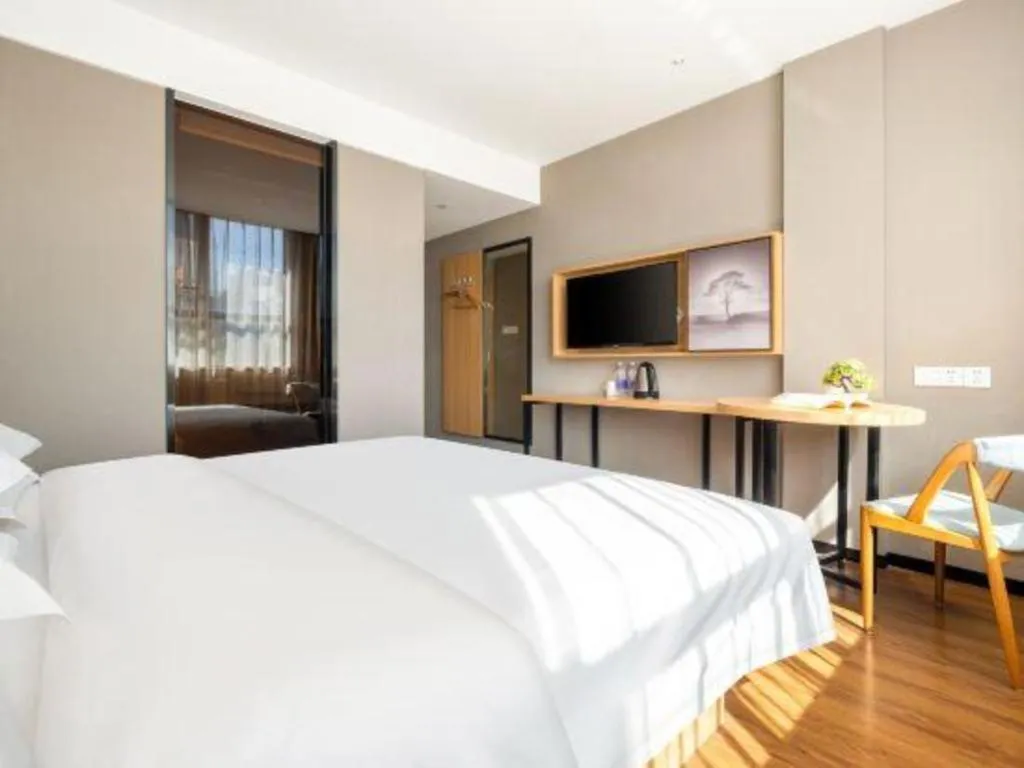 Bed in JTOUR Inn Guigang Life Port High-speed Railway Station