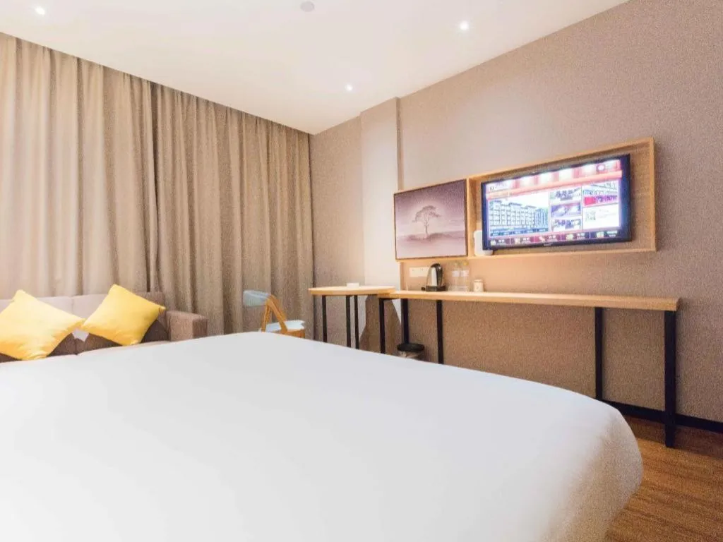 Bed in JTOUR Inn Guigang Life Port High-speed Railway Station