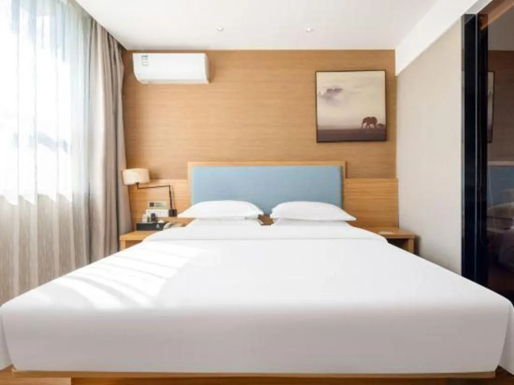 Bed in JTOUR Inn Guigang Life Port High-speed Railway Station