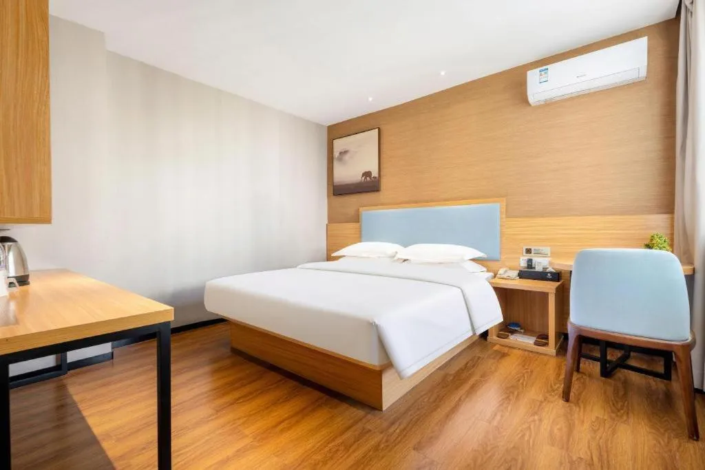 Bed in JTOUR Inn Guigang Life Port High-speed Railway Station